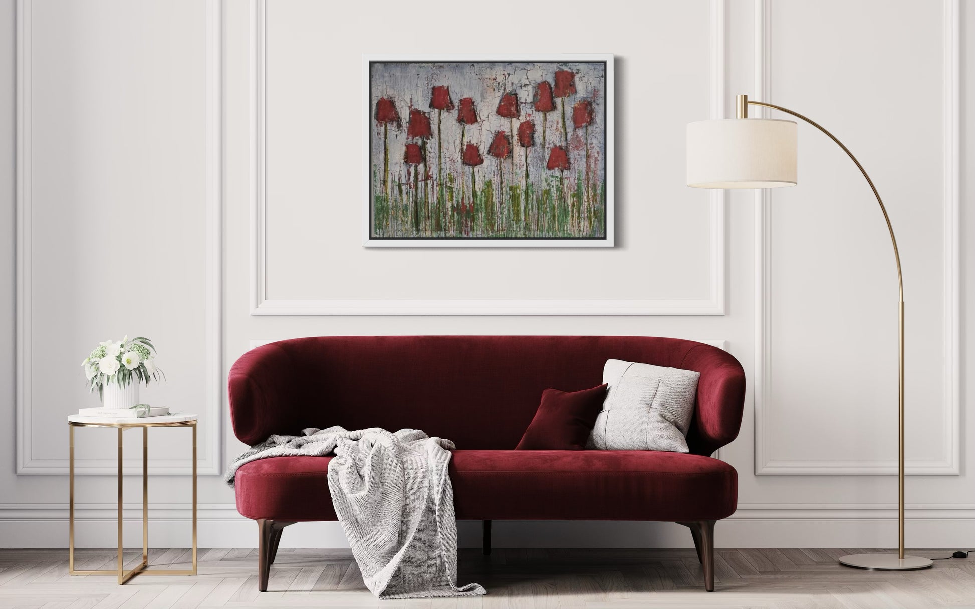 Dalla, Untitled. Red sofa in a living room with a painting of red tulips on the wall.