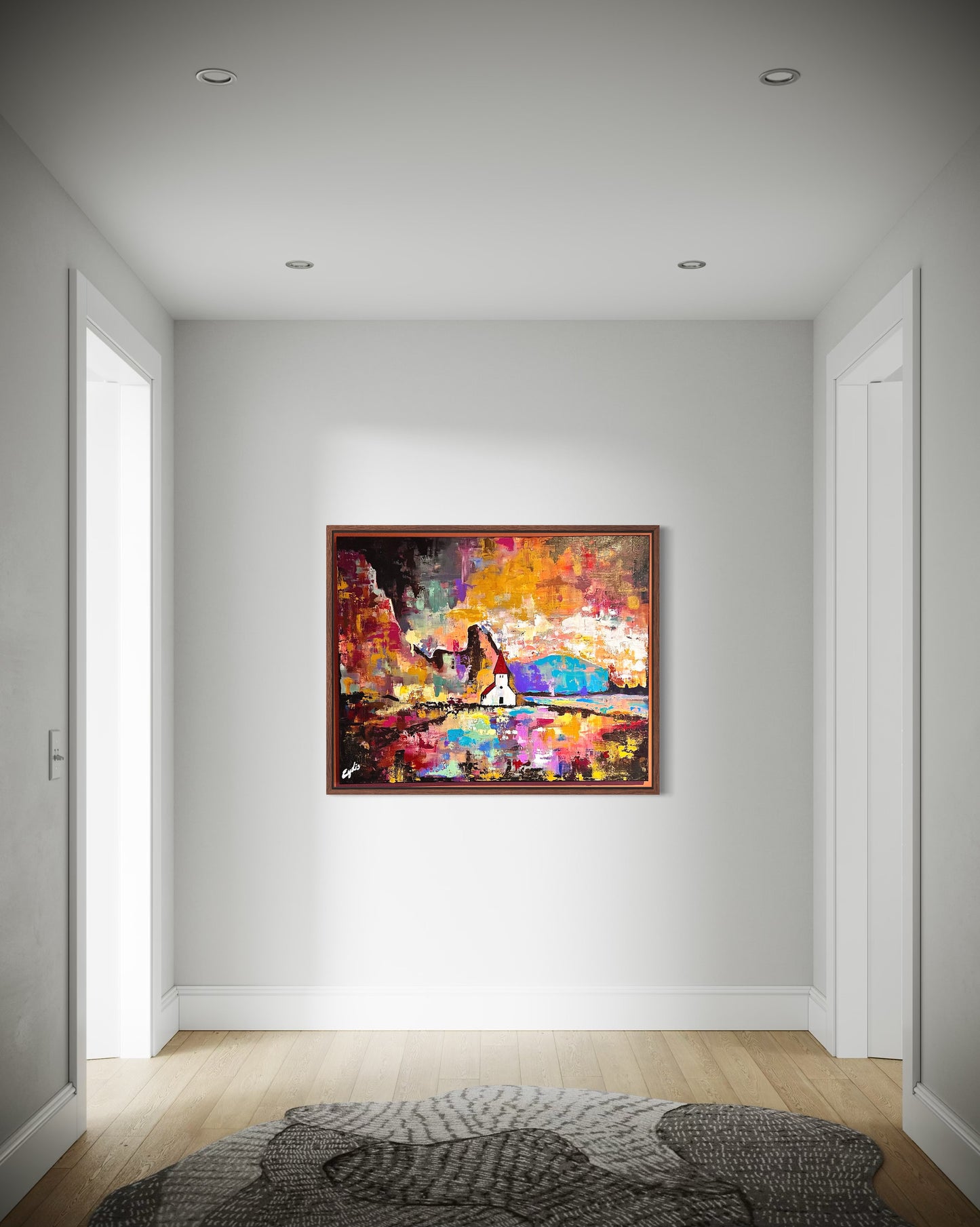 Colorful abstract Icelandic painting on a white wall in a minimalistic room.
